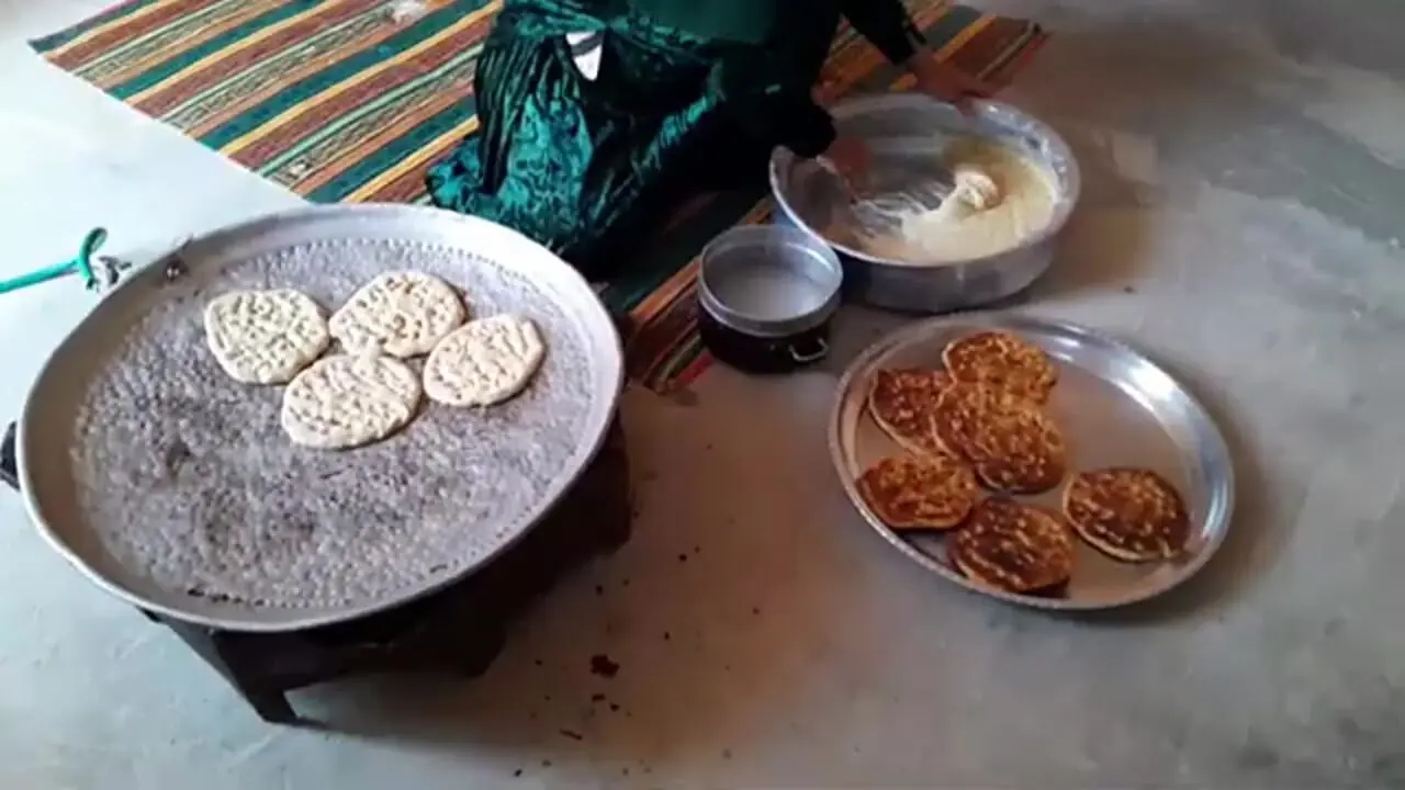 ببینید؛ غذای روستایی در ایران؛ پخت نان سنتی توسط یک بانوی عشایر