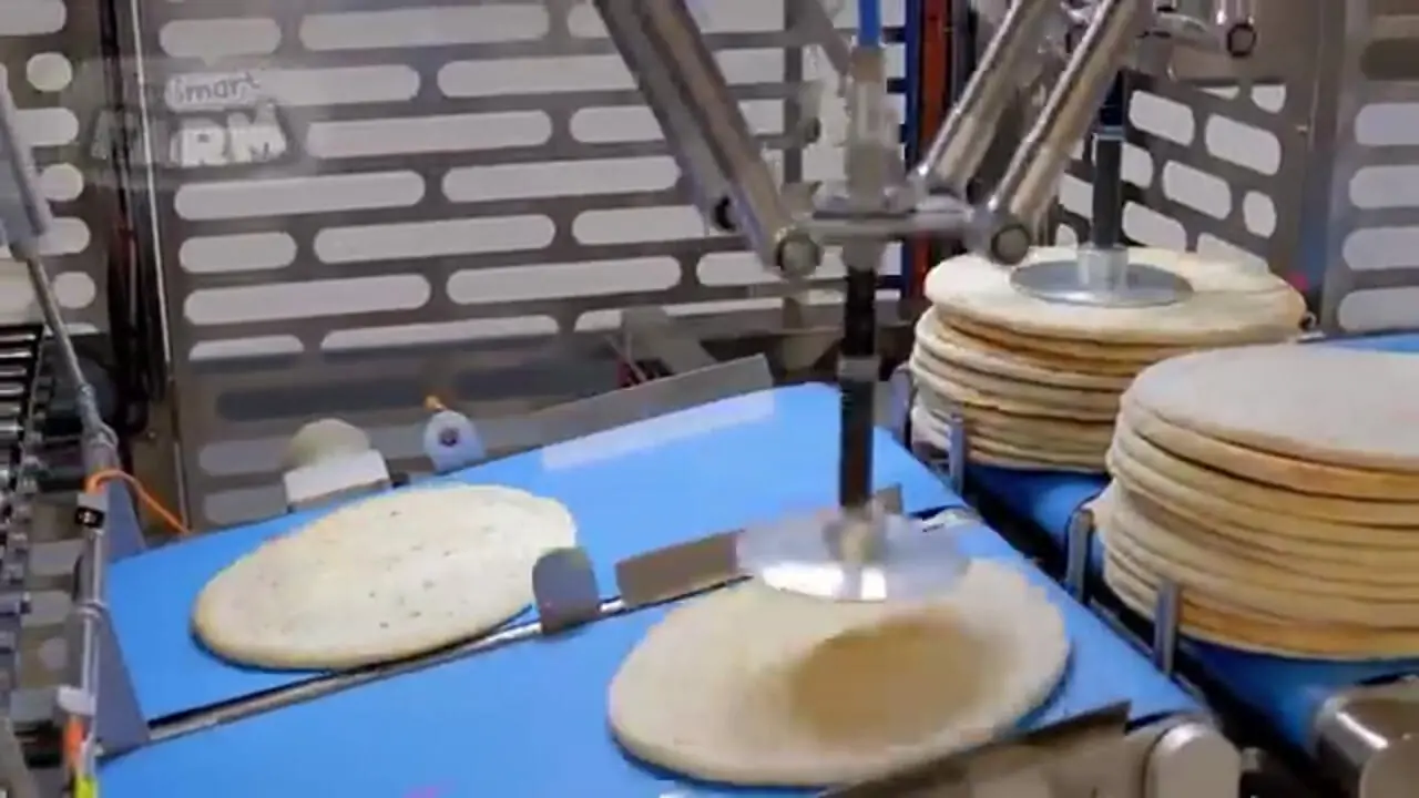 فرآیند تماشایی تولید انبوه پیتزای نیمه آماده در کارخانه ای مدرن در آمریکا